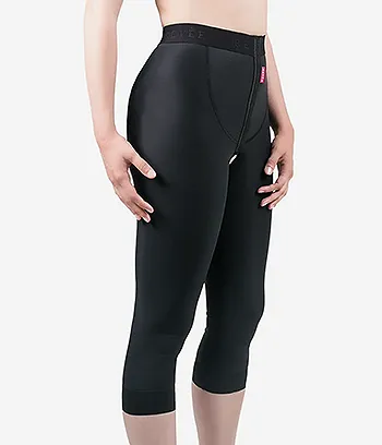 A side view women wearing Post Pelvic Surgery Compression Panties with the lenght Below Knee Length