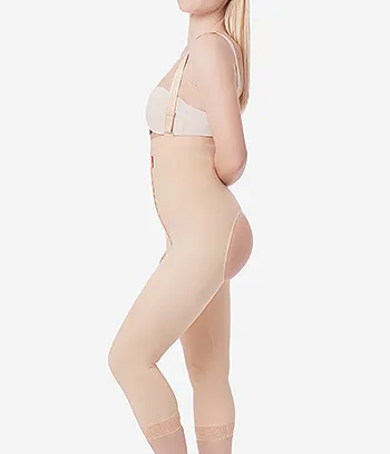 Side view of a beige BBL compression garment girdle with open buttock whole on the back